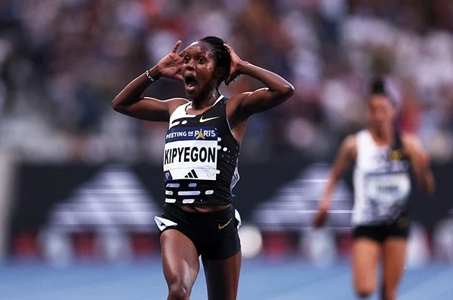 Faith Kipyegon breaks world record